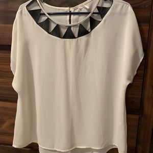 Sheer white T-shirt with leather detail